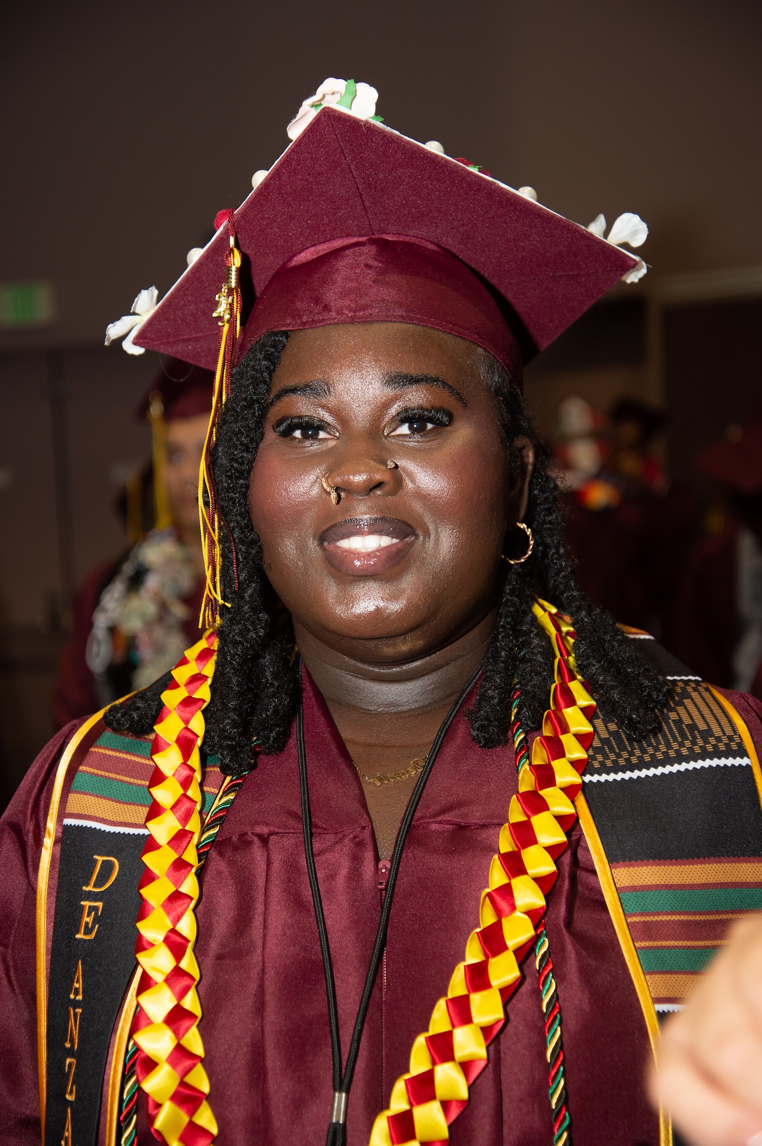grad in cap and gown