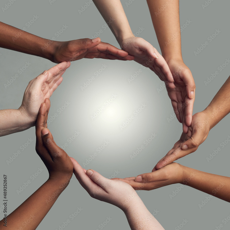 Diverse hands forming a circle