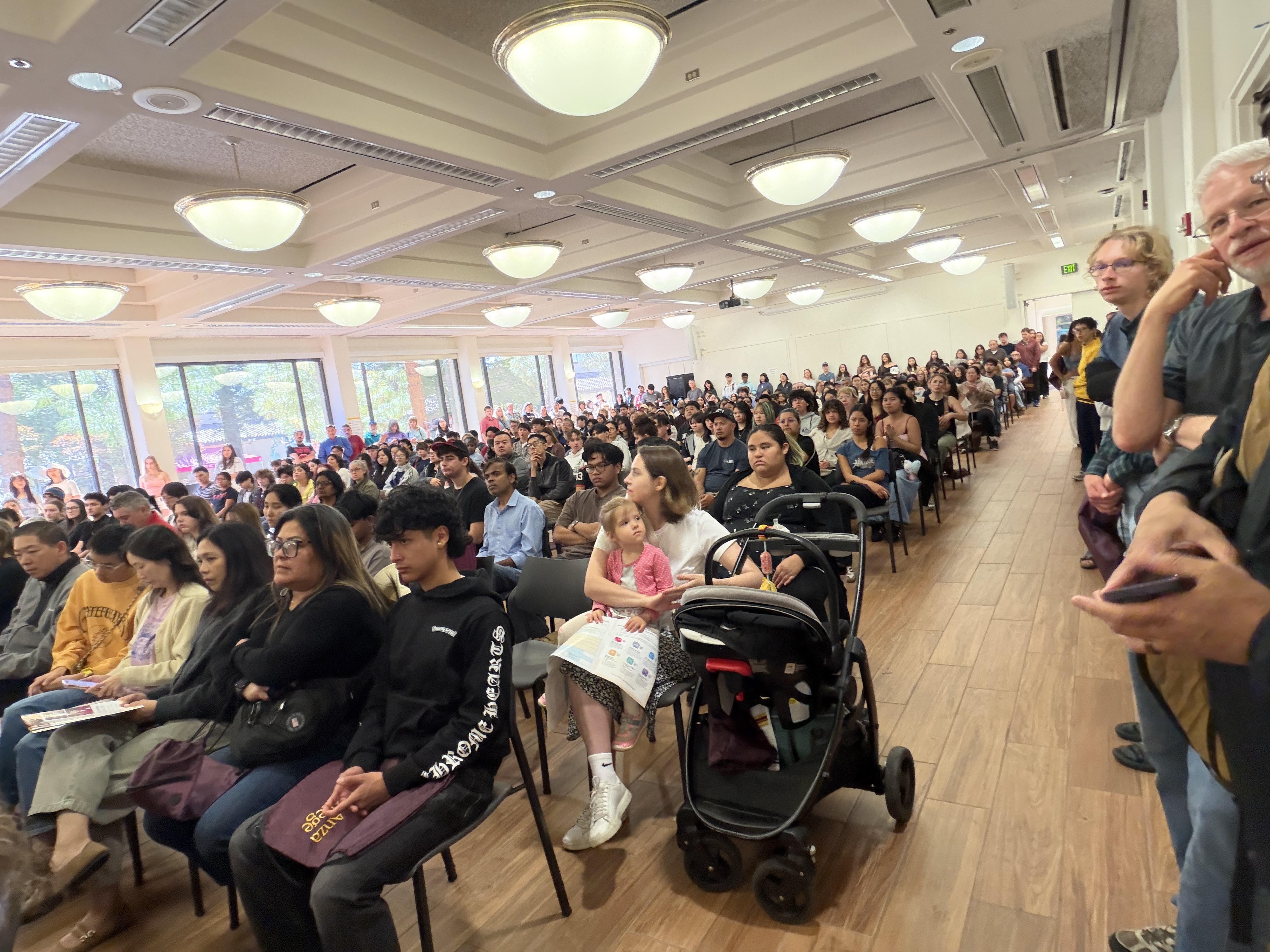 Attendees pack Conference Rooms A and B at the 2026 Open House welcome session