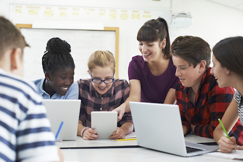 young students around table
